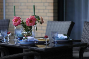 Ferienwohnung Strandoase inklusive Terrasse und Parkplatz - Sonnenseite